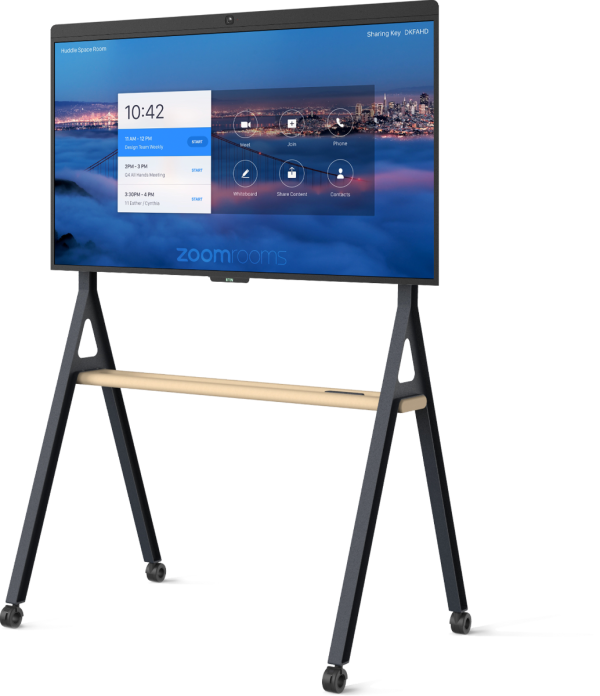 A DTEN D7 55" mobile digital display screen on a wheeled stand, showing the Zoom Rooms interface. The background of the screen features an aerial cityscape view of San Francisco with the Golden Gate Bridge. The display stand includes a wooden shelf below the screen.