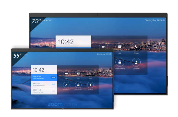 Two DTEN D7 55" monitors displaying Zoom Rooms interfaces. The larger screen shows scheduling details and a Sharing Key above the cityscape, with the time (10:42). The smaller screen mirrors the larger's interface, showing icons for Join, Phone, Whiteboard, Share Content, and Contacts.