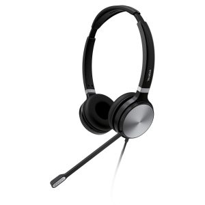 The UH36 Dual is a sleek black over-the-head headset featuring a built-in microphone and cushioned ear pads. The microphone extends from one of the ear cups and includes a small vented section at the end. The headset boasts a modern design with a combination of matte and glossy finishes.