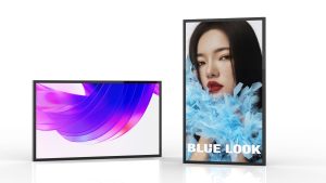 A landscape-oriented screen displaying abstract purple and blue swirls is next to a portrait-oriented screen featuring a woman with dark hair and bold red lipstick, partially covered by blue feathers, with the text "BLUE LOOK" at the bottom.